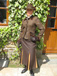 J 48 single breasted jacket with brown velvet trim piped in desert gold piping Shown with toning skirt.jpg